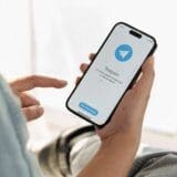 Screenshot of the Telegram app's account-switching feature, highlighting how to quickly toggle between multiple accounts on a single device