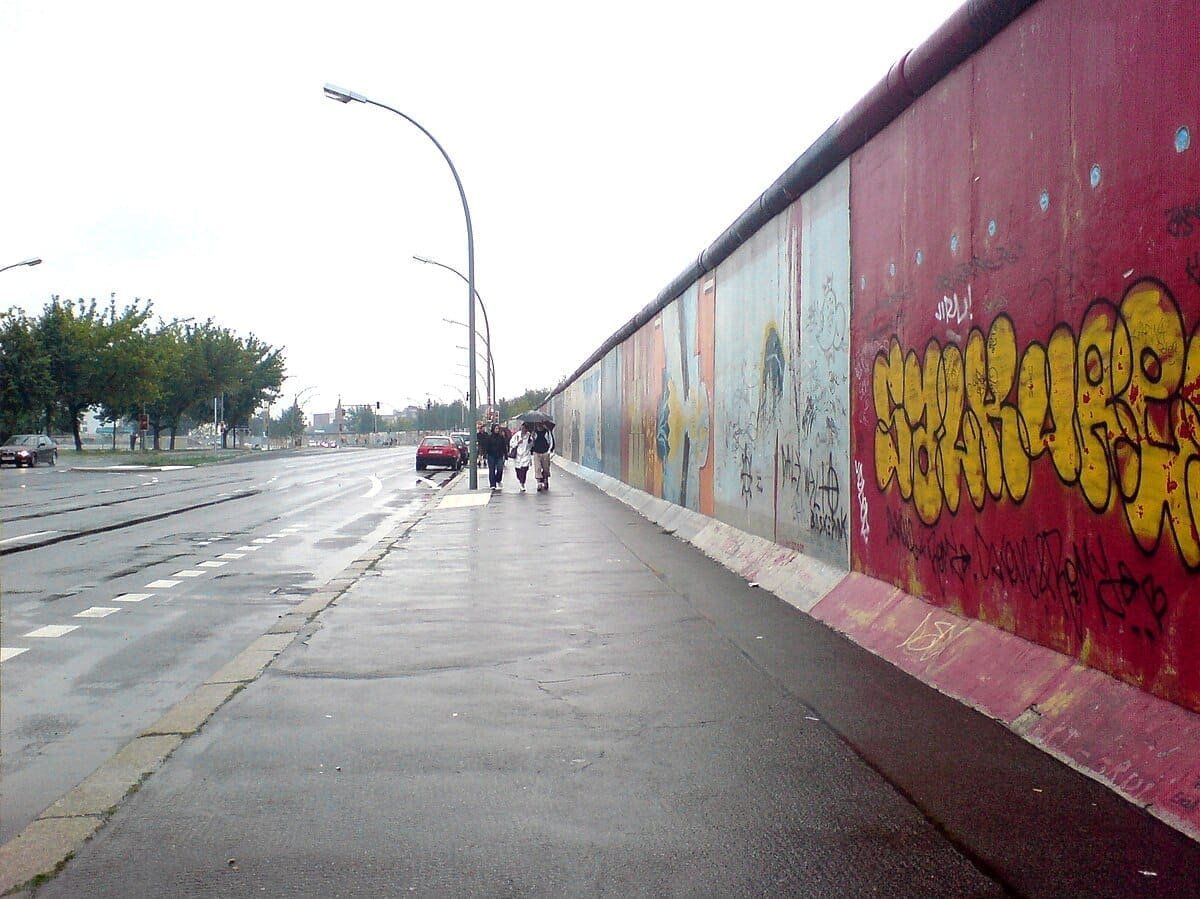 Remaining stretch of the Wall near Ostbahnhof in Friedrichshain called East Side Gallery. Photo: Wikipedia