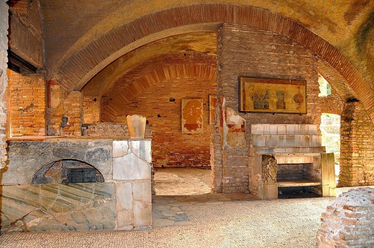 The shop is a Thermopolium that sells hot food and drink. It's Ancient Rome's version of a fast food restaurant. Photo: wikipedia.org