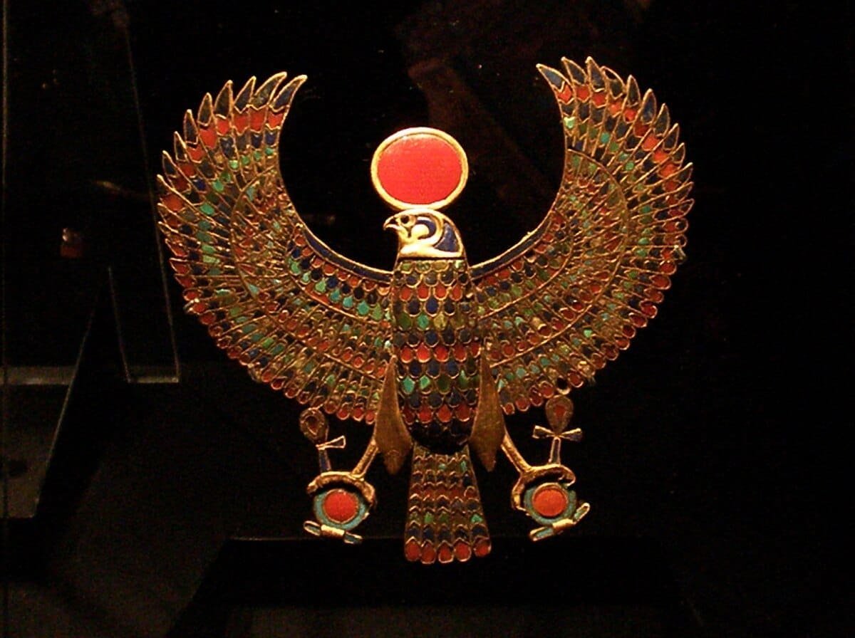 Jewelry of Ra as a falcon with spread wings, adorned with the sun-disk and holding the ankh, the hieroglyphic symbol of life. Photo: Amanda Slater, Wikimedia Commons