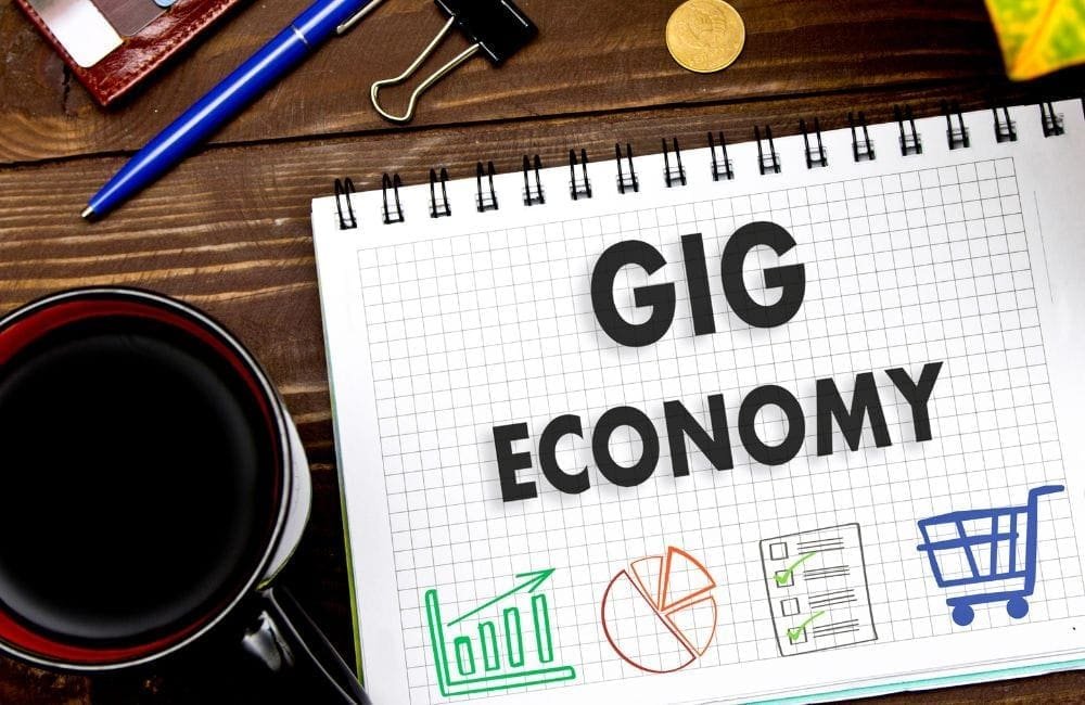 An image of the Gig Economy written on a graph paper.