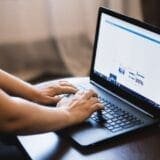 An image of a person creating a gig listing for an article about Fiverr titles.