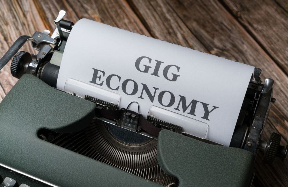 An image of gig economy written on a paper.