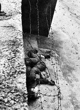 Fechter's body lying next to the Berlin Wall after being shot in 1962 while trying to escape to the West. Photo: Wikipedia
