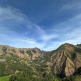 Scenic view of a mountain near Mt. Igatmon in Igbaras, Iloilo, with lush greenery and soft light—symbolizing peace, grounding, and quiet healing.