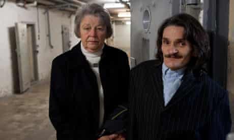 Sigrid Paul and her son Torsten Rührdanz in the Stasi prison in East Berlin, where she spent more than two years in the 60s. Photo: Christian Jungeblodt | The Guardian