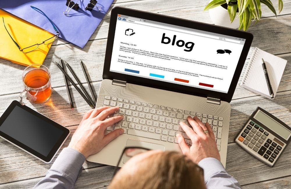 An image of a person writing a blog.