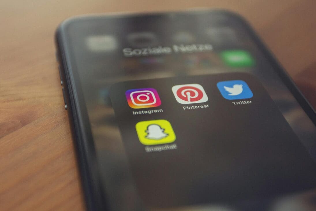 Various social media platforms showcasing pop culture predictions 2025