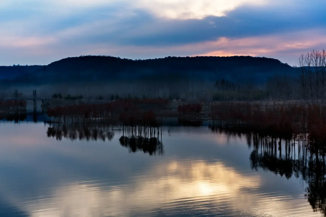 calm water watching by lake for mindfulness and natural energy healing