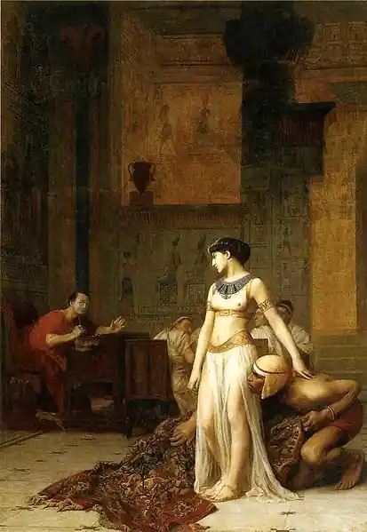 Cleopatra Before Caesar by Jean-Léon Gérôme (1866). The queen, expelled from Alexandria by her brother Ptolemy XIII, disguises herself to meet Julius Caesar and reclaim her throne. Photo: World History