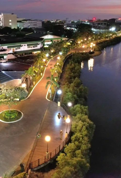 Iloilo Esplanade aerial night view – riverside lights and pathways for urban exploration and active staycation ideas.