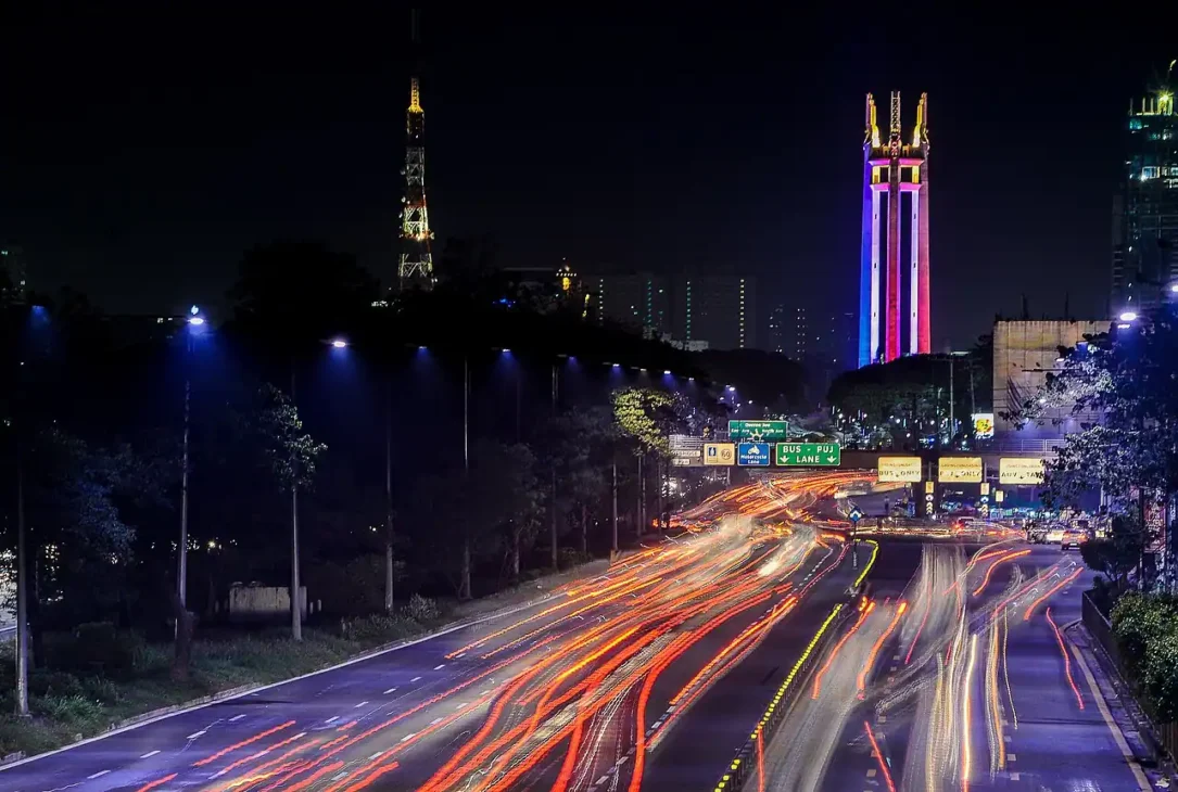 Quezon City nightlife with bustling streets – vibrant urban exploration and city staycation experience.
