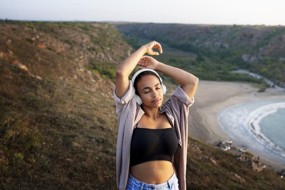 Traveler enjoying morning sunlight after long-haul flight, feeling refreshed and adjusted to the new time zone from jet lag tips.
