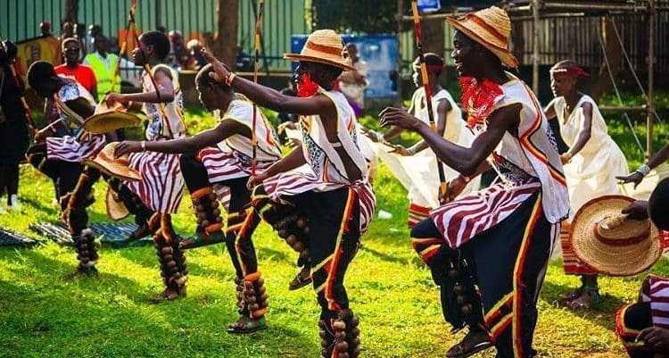 A scenic view of Northern Uganda’s cultural corridors with open landscapes, traditional communities, and a calm travel route suggesting a slower, culturally rooted stay.