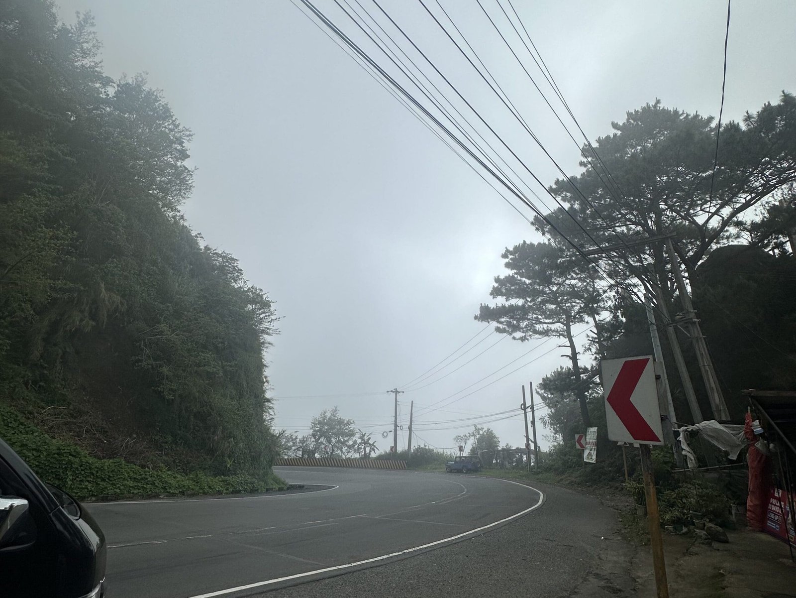 Foggy mountain road in Northern Luzon during the journey home from Baguio City