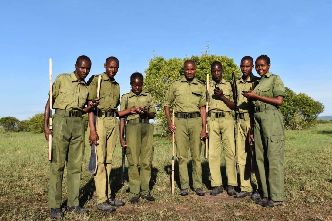 East African wildlife rangers on patrol protecting elephants and other wildlife in a conservancy.