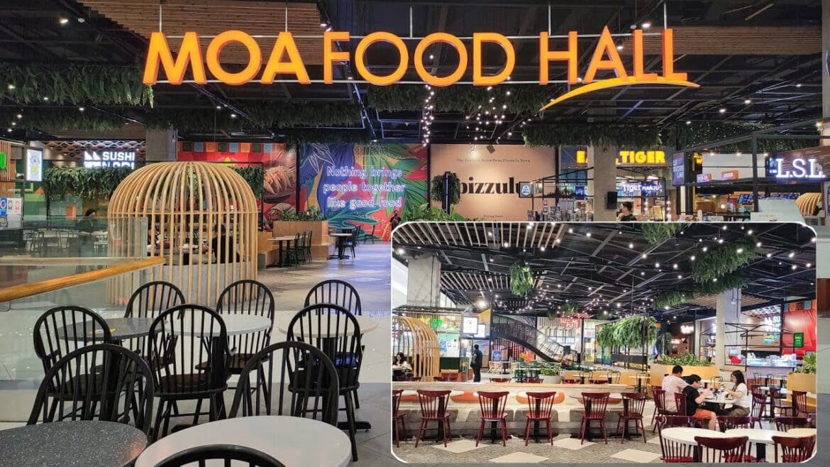 SM Mall of Asia (MOA) Food Hall in Pasay, Philippines, showing diners enjoying meals in a bustling, air-conditioned space.